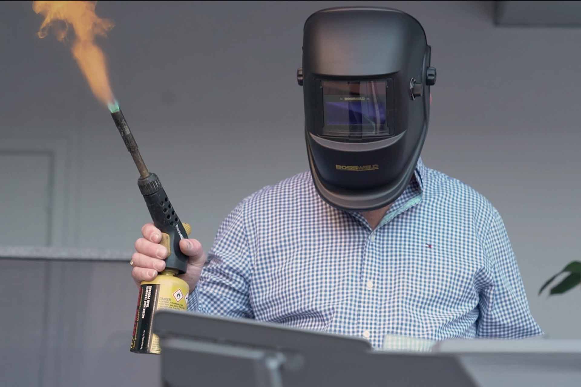 Man with blowtorch