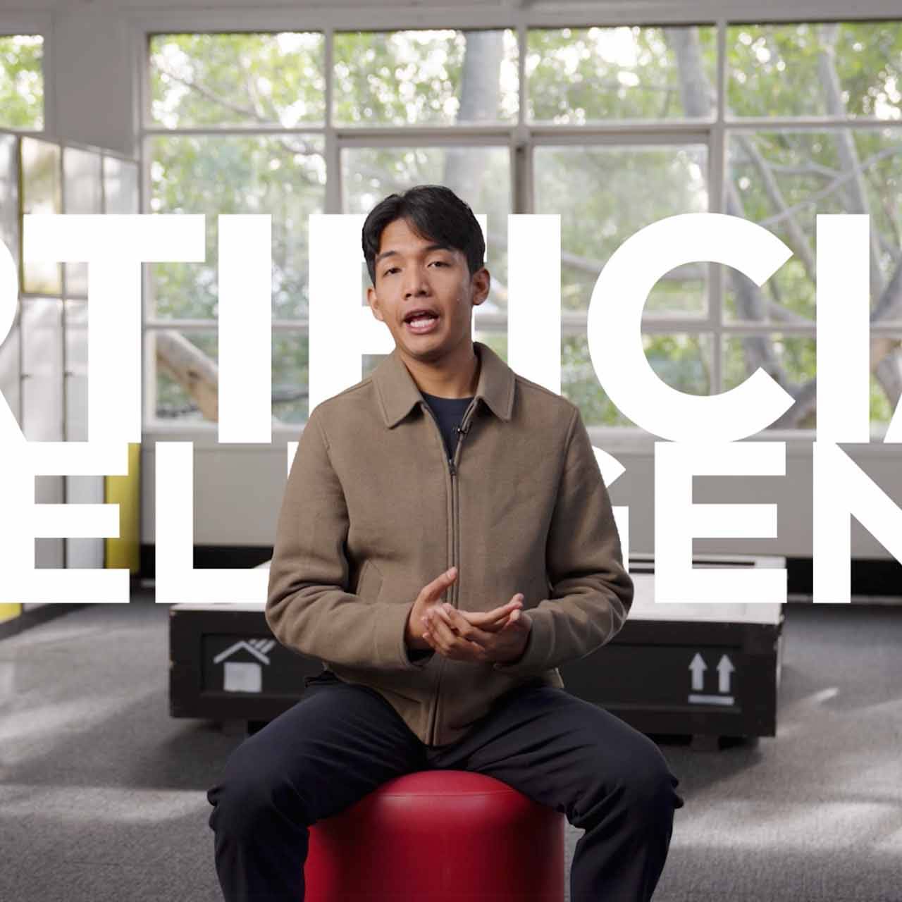 Young man with text graphic behind