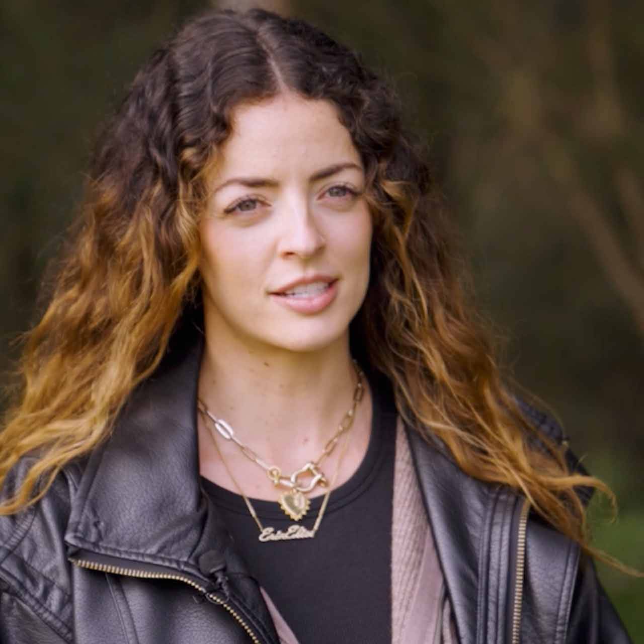 Woman talking to camera